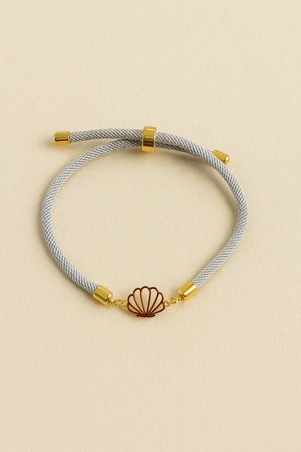 Shell gold & cord bracelet