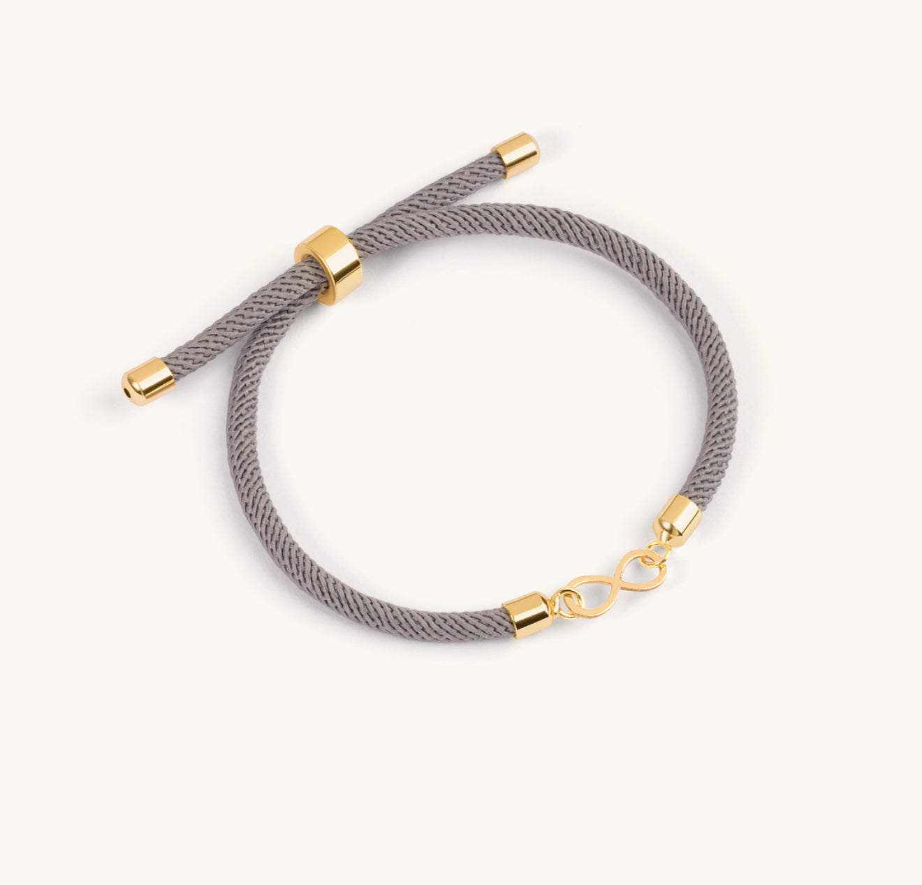 Infinity Gold & cord bracelet