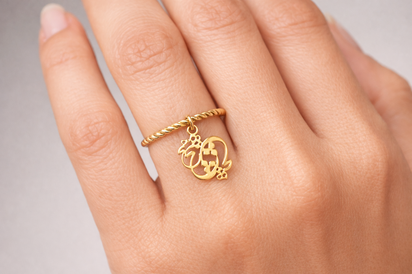 Twist Gold Ring with Persian Charm